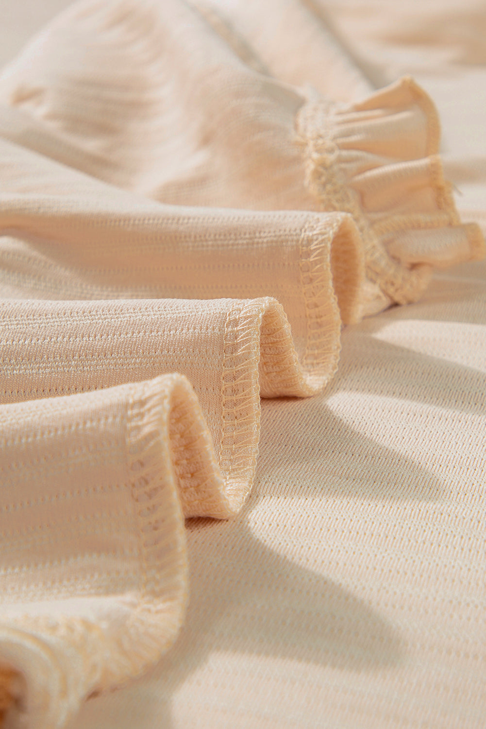 Light Pink Solid Textured Ruffled Short Sleeve Blouse